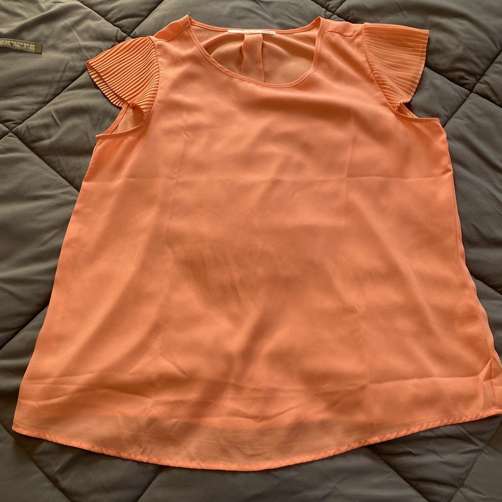 Fun2fun sheer peach blouse with frilly sleeves. Sized Medium. Like new.
